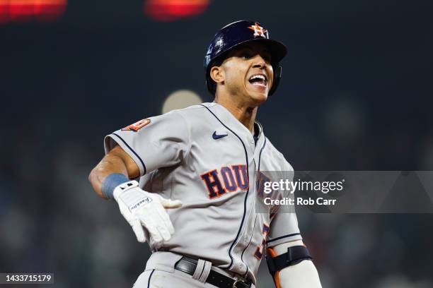 Jeremy Pena of the Houston Astros reacts after hitting a solo home run during the eighteenth inning against the Seattle Mariners in game three of the...