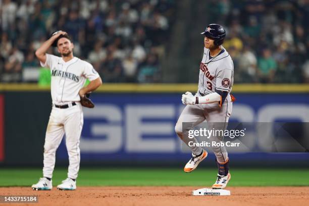 Jeremy Pena of the Houston Astros reacts after hitting a solo home run during the eighteenth inning against the Seattle Mariners in game three of the...