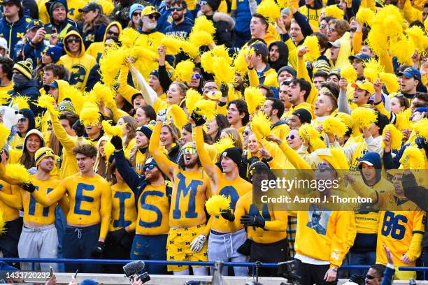 Fans are seen cheering during the second half of a college football game between the Michigan Wolverines and the Penn State Nittany Lions at Michigan...