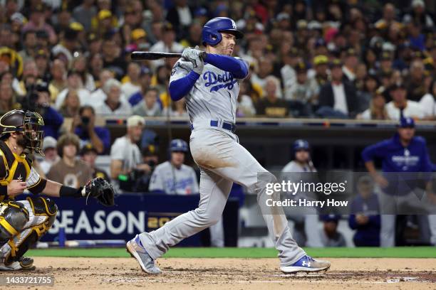 Freddie Freeman of the Los Angeles Dodgers hits a two-run RBI double during the third inning against the San Diego Padres in game four of the...