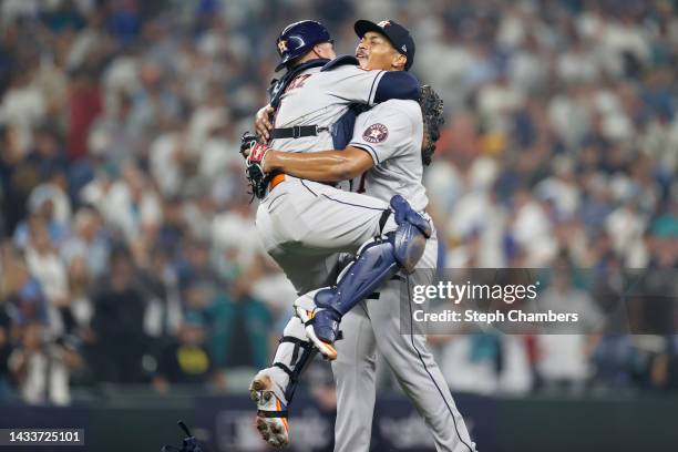 Luis Garcia of the Houston Astros reacts with Christian Vazquez after defeating the Seattle Mariners 1-0 in game three of the American League...
