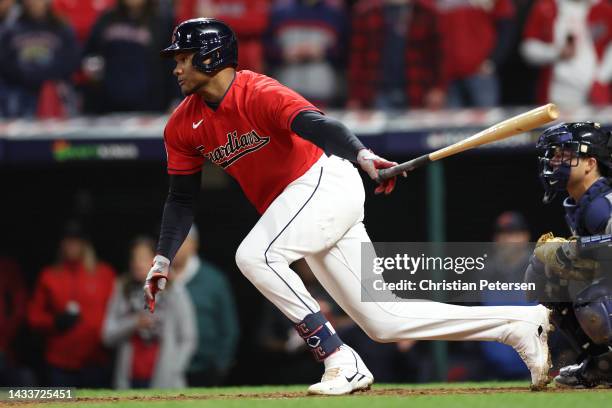 Oscar Gonzalez of the Cleveland Guardians hits a walk off single during the ninth inning against the New York Yankees in game three of the American...