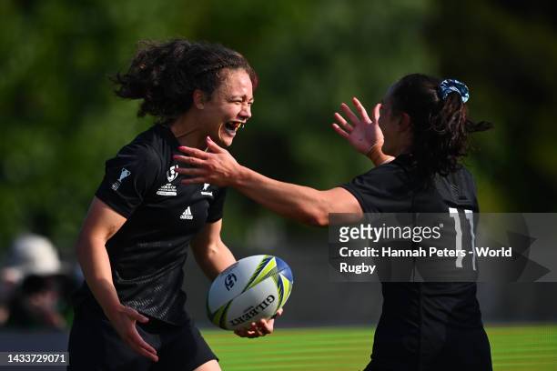 Ruby Tui of New Zealand celebrates scoring a try with Portia Woodman of New Zealand during the Pool A Rugby World Cup 2021 match between Wales and...
