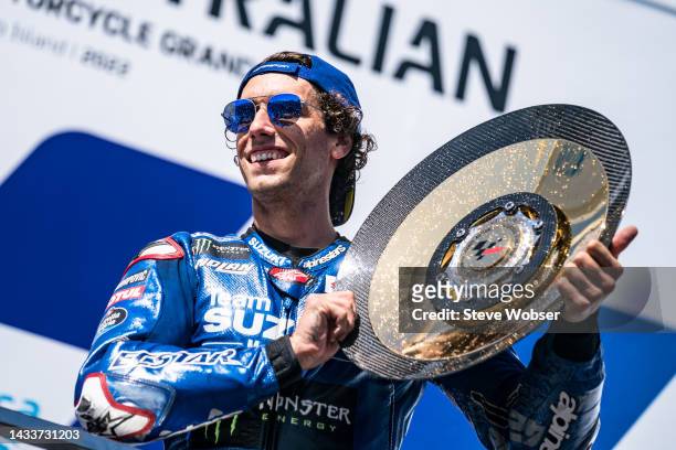 Race winner Alex Rins of Spain and Team SUZUKI ECSTAR on the podium with his trophy during the race of the MotoGP of Australia at Phillip Island...