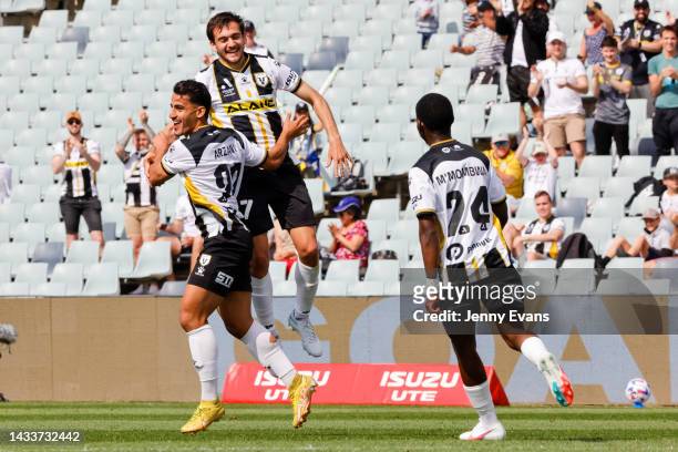 Daniel Arzani of Macarthur FC celebrates with tam mates after scoring a goal during the round two A-League Men's match between Macarthur FC and...