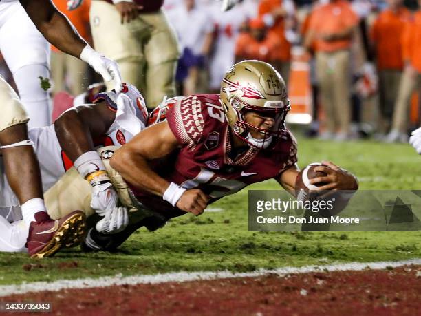Quarterback Jordan Travis of the Florida State Seminoles attepmts to dive in the endzone only to come up short during the game against the Clemson...