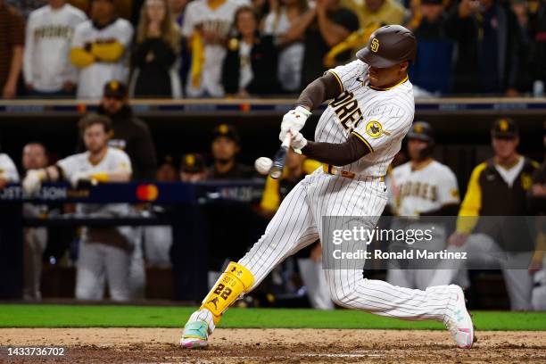 Juan Soto of the San Diego Padres hits a RBI single during the seventh inning against the Los Angeles Dodgers in game four of the National League...