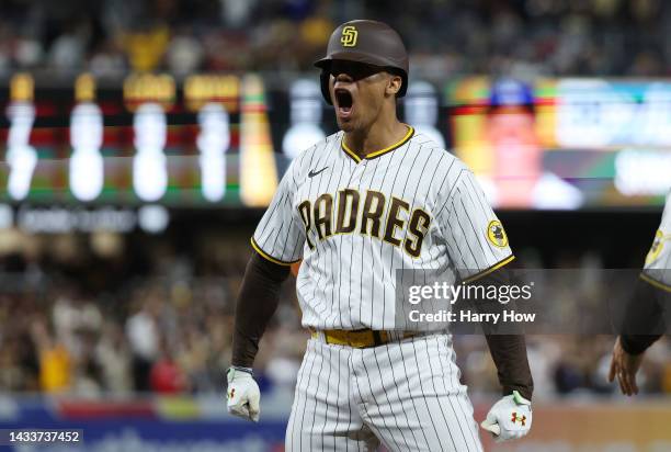 Juan Soto of the San Diego Padres celebrates after hitting a RBI single during the seventh inning against the Los Angeles Dodgers in game four of the...