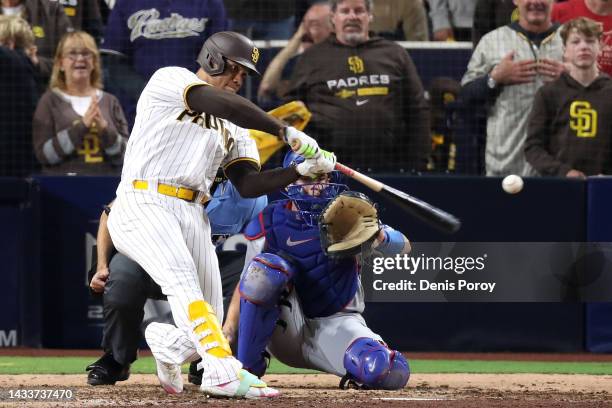 Juan Soto of the San Diego Padres hits a RBI single during the seventh inning against the Los Angeles Dodgers in game four of the National League...