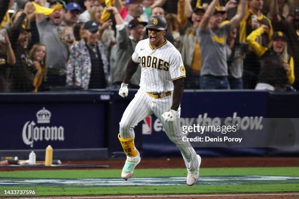 Juan Soto of the San Diego Padres celebrates after hitting a RBI single during the seventh inning against the Los Angeles Dodgers in game four of the...