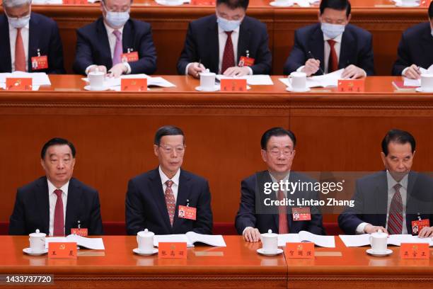 Delegates Wang Chen, Zhang Gaoli ,He Guoqiang and Wu Guanzheng attend the opening session of the 20th National Congress of the Communist Party of...