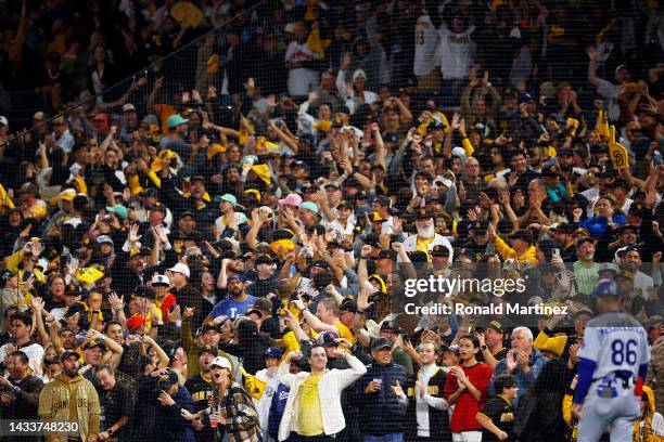 San Diego Padres fans celebrate after defeating the Los Angeles Dodgers 5-3 in game four of the National League Division Series at PETCO Park on...