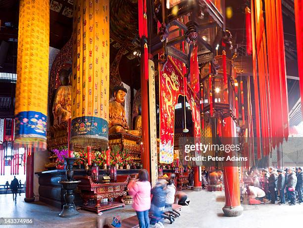 jade buddha temple, shanghai, china - red buddha statue stock pictures, royalty-free photos & images