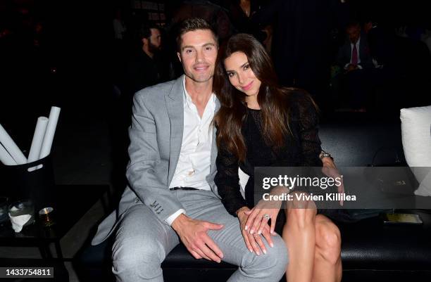 Eric Winter and Roselyn Sánchez attend the AdoptTogether Baby Ball 2022 at the Radford Studio Center on October 15, 2022 in Studio City, California.