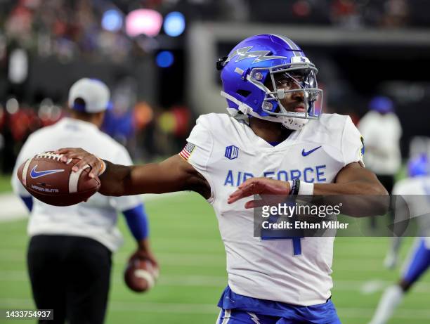 Quarterback Haaziq Daniels of the Air Force Falcons throws during warmups before a game against the UNLV Rebels at Allegiant Stadium on October 15,...