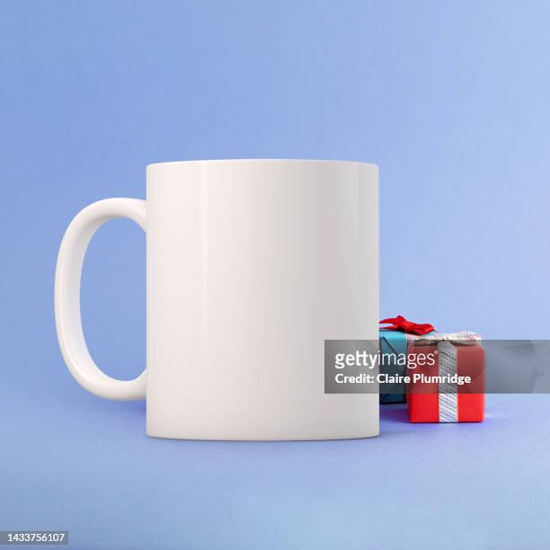 white blank coffee mug christmas theme mock up. - mug mockup stock pictures, royalty-free photos & images