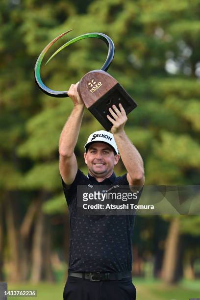 Keegan Bradley of the United States lifts the trophy at the award ceremony after winning the tournament following the final round of the ZOZO...