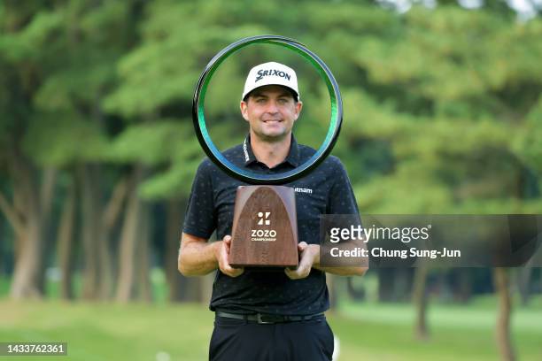 Keegan Bradley of the United States poses with the trophy at the award ceremony after winning the tournament following the final round of the ZOZO...