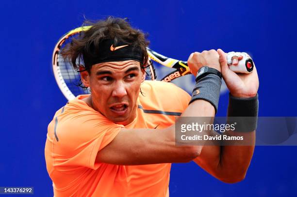 Rafael Nadal of Spain returns the ball to Guillermo Garcia-Lopez of Spain during their match on day 3 of the ATP 500 World Tour Barcelona Open Banco...