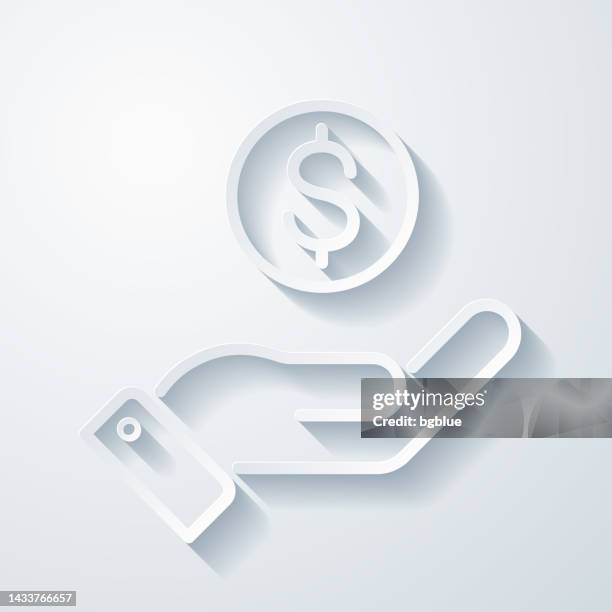 dollar coin in hand. icon with paper cut effect on blank background - fees stock illustrations