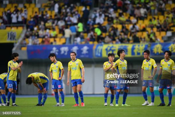 Tochigi SC players show dejection after the 2-3 defeat in the J.LEAGUE Meiji Yasuda J2 41st Sec. Match between Tochigi SC and Mito Hollyhock at...
