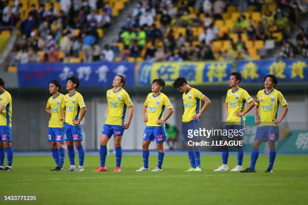 Tochigi SC players show dejection after the 2-3 defeat in the J.LEAGUE Meiji Yasuda J2 41st Sec. Match between Tochigi SC and Mito Hollyhock at...