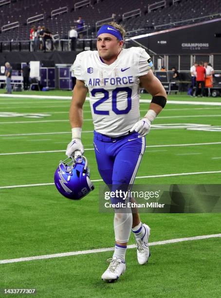 Running back Brad Roberts of the Air Force Falcons runs off the field after being interviewed following his four-touchdown game against the UNLV...