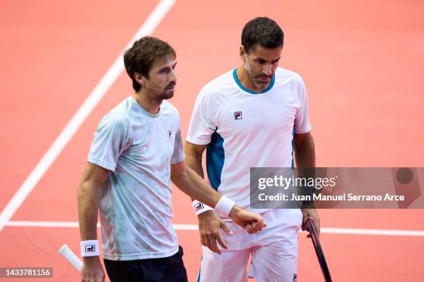 Maximo Gonzalez of Argentina interacts with partner Andres Molteni of Argentina against Nathaniel Lammons and Jackson Withrow of USA during their...