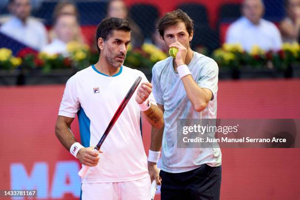 Maximo Gonzalez of Argentina interacts with partner Andres Molteni of Argentina against Nathaniel Lammons and Jackson Withrow of USA during their...