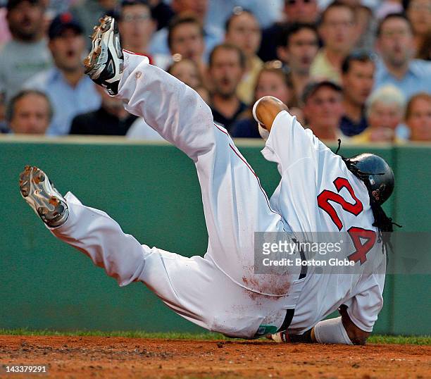 Manny Ramirez has both his hair and his body go flying as he ducks out of the way of a second inning buzz pitch from Roy Halladay, he got the last...