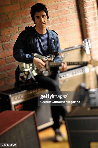 English guitarist and songwriter Johnny Marr, most famous for his work with English alternative rock band The Smiths, during a portrait shoot for...