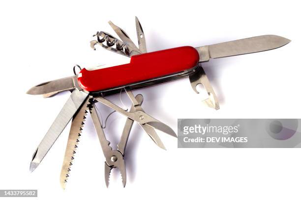 multi purpose knife on white background - multipurpose tool stock-fotos und bilder