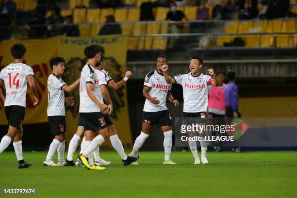Roasso Kumamoto players celebrate scoring their side's first goal during the J.LEAGUE Meiji Yasuda J2 41st Sec. Match between Vegalta Sendai and...
