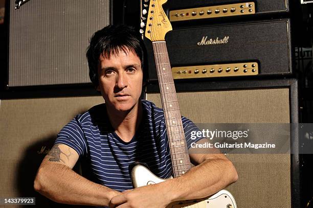 English guitarist and songwriter Johnny Marr, most famous for his work with English alternative rock band The Smiths, during a portrait shoot for...
