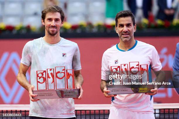 Maximo Gonzalez and Andres Molteni of Argentina celebrate with the trophy after winning match point against Nathaniel Lammons and Jackson Withrow of...