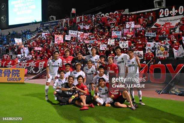 Zweigen Kanazawa players celebrate their side's victory after the J.LEAGUE Meiji Yasuda J2 41st Sec. Match between Yokohama FC and Zweigen Kanazawa...