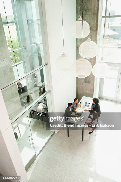 business people working together in office - distant meeting stock pictures, royalty-free photos & images