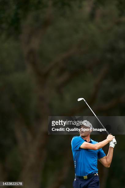 Benjamin Hebert of France watches his shot during Day Four of the Estrella Damm N.A. Andalucía Masters at Real Club Valderrama on October 16, 2022 in...