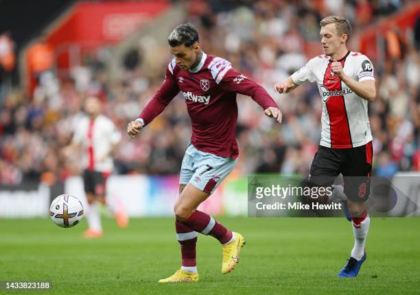 Gianluca Scamacca of West Ham United is challenged by James Ward-Prowse of Southampton during the Premier League match between Southampton FC and...