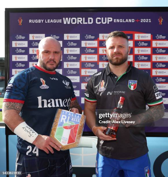 Nathan Brown of Italy and Dale Ferguson of Scotland pose for a photo ahead of the Rugby League World Cup 2021 Pool B match between Scotland and Italy...