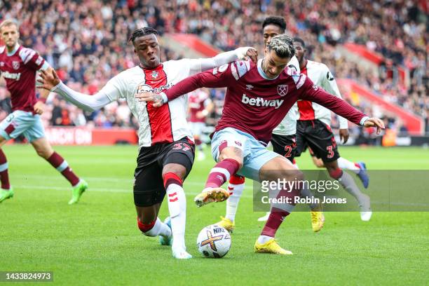 Gianluca Scamacca of West Ham United holds off Armel Bella-Kotchap of Southampton during the Premier League match between Southampton FC and West Ham...