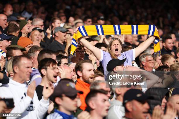 Leeds United fan shows their support with a scarf prior to the Premier League match between Leeds United and Arsenal FC at Elland Road on October 16,...