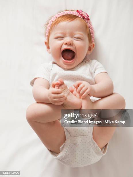 laughing caucasian baby girl - 4 months stock pictures, royalty-free photos & images