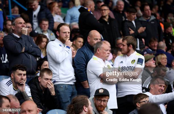 Leeds United fans look on as kick off is delayed due to a technical issue during the Premier League match between Leeds United and Arsenal FC at...