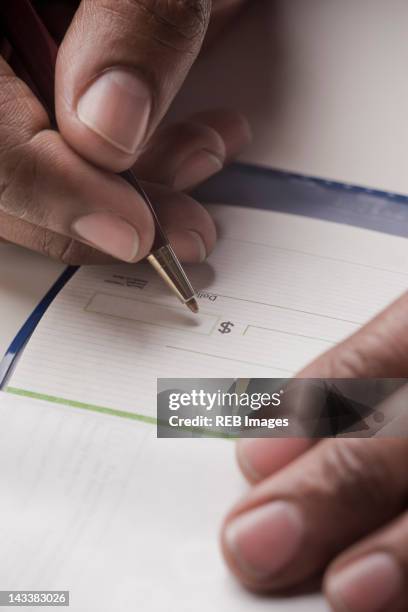 Man Write Check 45 Old Person Writing A Check Stock Photos, High-Res Pictures, and ...
