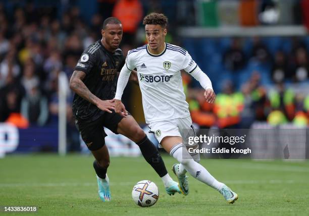 Rodrigo Moreno of Leeds United is challenged by Gabriel Magalhaes of Arsenal during the Premier League match between Leeds United and Arsenal FC at...