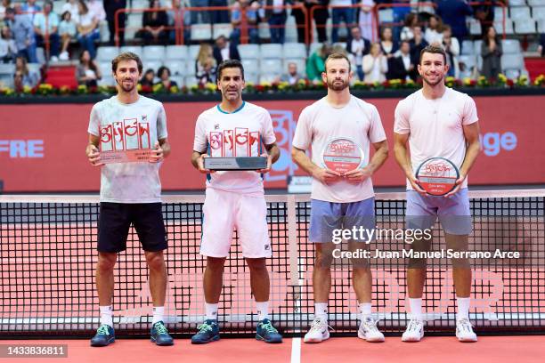 Maximo Gonzalez and Andres Molteni of Argentina celebrate with the trophy after winning match point against Nathaniel Lammons and Jackson Withrow of...