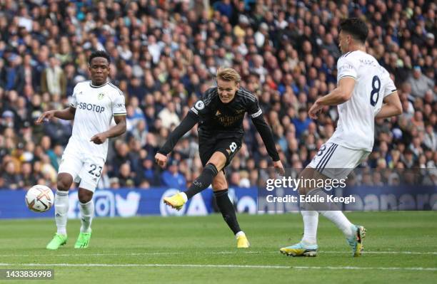 Martin Oedegaard of Arsenal shoots during the Premier League match between Leeds United and Arsenal FC at Elland Road on October 16, 2022 in Leeds,...