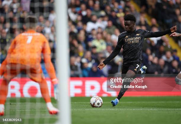 Bukayo Saka of Arsenal scores their team's first goal during the Premier League match between Leeds United and Arsenal FC at Elland Road on October...