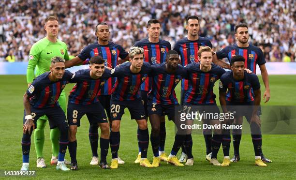 Barcelona players pose for a photo wearing a modified match shirt containing a modified OVO owl logo on the front of the FC Barcelona shirt, which...